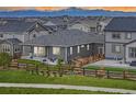 The property showcases a fenced backyard with a covered patio, perfect for outdoor relaxation and mountain views at 12846 Palisade St, Mead, CO 80504