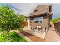 Private patio with stylish seating, perfect for outdoor relaxation at 6892 Juniper Ct, Arvada, CO 80007