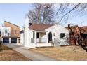 Updated home with driveway, landscaping, and a modern style at 2809 Forest St, Denver, CO 80207