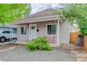 Cozy house featuring charming architecture and a well-kept front yard at 737 La Farge Ave, Louisville, CO 80027