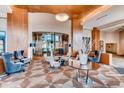 A bright lobby with modern furnishings, showcasing sophisticated design and an inviting atmosphere for residents and guests at 8100 E Union Ave # 310, Denver, CO 80237