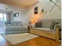 Cozy living room with plush seating and neutral tones creating a warm, inviting atmosphere at 6836 W 84Th Cir # 15, Arvada, CO 80003