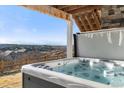 Hot tub on patio with nice views at 1721 Wingfeather Ln, Castle Rock, CO 80108