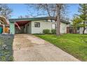 Inviting single-story home featuring a covered carport and low maintenance front yard at 7948 Stuart St, Westminster, CO 80030