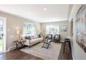 Sun-filled living room featuring hardwood floors, stylish seating, and an open layout, perfect for entertaining at 500 S Pennsylvania St # 520, Denver, CO 80209