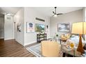 Living room with modern decor and flooring, complemented by neutral wall colors and ample lighting at 5401 S Park Terrace Ave # 105A, Greenwood Village, CO 80111