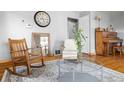 Inviting living room with hardwood floors, comfortable seating, and natural light at 875 S Dale Ct, Denver, CO 80219