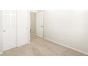 Bright bedroom with carpet flooring, closet and neutral paint at 6068 Corral St, Brighton, CO 80601