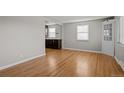 Bright living room featuring hardwood floors, neutral paint, and lots of natural light at 4499 E Colorado Ave, Denver, CO 80222