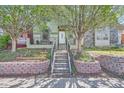 Inviting home featuring a landscaped front yard and a welcoming entryway at 2530 N Franklin St, Denver, CO 80205