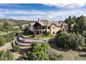 Luxury home with a large backyard and mountain views at 4479 Tierra Alta Dr, Castle Rock, CO 80104