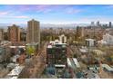 Urban view overlooking the cityscape, capturing a mix of modern architecture and natural landscape with mountains in the distance at 1200 Vine St # 5G, Denver, CO 80206