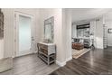 Inviting foyer featuring neutral tones and seamless entry to the cozy living room at 2110 W 67Th Pl, Denver, CO 80221