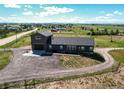 Lovely aerial view of home with extended driveway on a sprawling lot at 42919 Vista Rdg, Parker, CO 80138