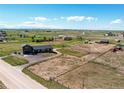Expansive aerial view of a ranch style home with large lot in a rural setting at 42919 Vista Rdg, Parker, CO 80138