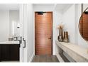 Elegant foyer featuring a stylish console table, decor, and a glimpse into the bathroom at 1901 Wazee St # 304, Denver, CO 80202