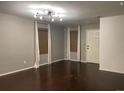 Bright living room with hardwood floors and neutral wall colors at 269 Ponderosa Pl, Fort Lupton, CO 80621