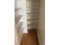 Walk-in pantry offering ample storage space with multiple shelves at 482 S Kalispell Way # E, Aurora, CO 80017