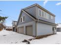 Detached two-car garage with extra living space above at 2615 N Steele St, Denver, CO 80205