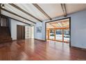 Spacious living room with hardwood floors and large windows at 11143 W Ohio Pl, Lakewood, CO 80226