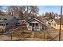 Aerial view of the home showing the cozy yard and surrounding neighborhood at 3947 Winona Ct, Denver, CO 80212