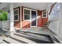 Inviting front porch with seating area and views at 2813 Central Park Blvd, Denver, CO 80238