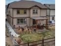 Aerial view of house and backyard with patio and pergola at 8827 Gore St, Arvada, CO 80007