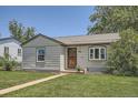 Charming home featuring a well-maintained lawn and inviting curb appeal at 1140 S Xavier St, Denver, CO 80219