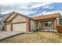 Charming single-Gathering home featuring a well-manicured lawn and a convenient two-car garage at 965 W 96Th Ave, Thornton, CO 80260