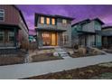 Beautiful two-story home with a contemporary design and a welcoming walkway at 6052 N Malta St, Aurora, CO 80019