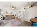 Bright living room with hardwood floors and comfy furniture at 1217 Osceola St, Denver, CO 80204