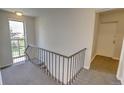 Apartment staircase with view of outdoors at 2100 N Franklin St # 8, Denver, CO 80205