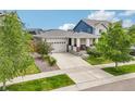 Charming single-Gathering home with a well-manicured lawn, two car garage and inviting front porch at 5928 N Odessa St, Aurora, CO 80019