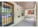 Comfortable front porch with a porch swing, perfect for enjoying a cup of coffee at 1226 Clayton St, Denver, CO 80206