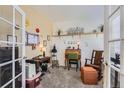 Bright and inviting sewing room features natural light, a charming sewing table, and decor at 6694 S Rome St, Aurora, CO 80016