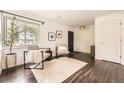 Bright living room with modern furniture, large windows, and stylish decor at 2540 Kendall St, Edgewater, CO 80214