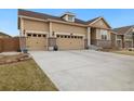 Attractive home with a spacious driveway and a three-car garage, providing ample parking at 16034 Columbine St, Thornton, CO 80602