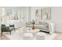 Stylishly furnished living room with comfortable seating, accent pillows, and decorative artwork at 5282 E 116Th Ave, Thornton, CO 80233