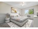 Serene bedroom with neutral decor and plenty of space for relaxation at 605 S Alton Way # 9C, Denver, CO 80247