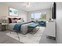 Comfortable main bedroom with ample natural light and a sitting area at 605 S Alton Way # 9C, Denver, CO 80247