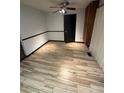 Bedroom featuring neutral paint, a ceiling fan, and laminate wood flooring at 3923 S Idalia St, Aurora, CO 80013