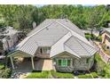Aerial view of the home with its extensive roof and private backyard at 85 Silver Fox Dr, Greenwood Village, CO 80121