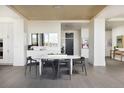 Elegant dining room with modern table and chairs at 1750 Wewatta St # 1940, Denver, CO 80202