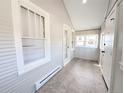 Sunroom filled with natural light and access to the outside at 1164 Wabash St, Denver, CO 80220