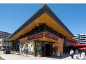 Exterior view of Culinary Dropout restaurant, featuring unique architecture and inviting outdoor signage at 1437 Garfield St, Denver, CO 80206