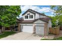 Charming two-story home features a three-car garage and well-manicured lawn in a desirable neighborhood at 13307 Humboldt Dr, Thornton, CO 80241