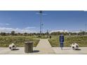 Well-maintained soccer fields under a clear blue sky, perfect for sports and recreation at 22017 E 39Th Pl, Aurora, CO 80019