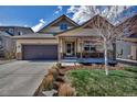 Inviting single-Gathering home with a covered porch, well-maintained lawn, and desirable curb appeal at 4032 Donnington Cir, Castle Rock, CO 80104