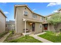 Charming townhome with inviting front porch, perfect for relaxing and enjoying the outdoors at 1061 S Yampa St # C, Aurora, CO 80017