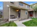 Inviting front porch with seating area, offering a warm welcome to this lovely home at 1061 S Yampa St # C, Aurora, CO 80017